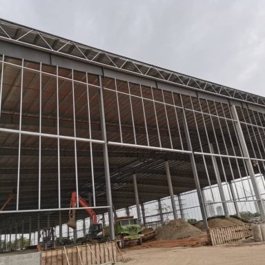 A project picture of jobsite showing the steel structure of purlins and metal roofing sheets Juta Steel galvanised purlins Bumbung Besi JSC JSZ JutaDek 762 Metal Roofing Sheets Transparent Sheet PC roofing FRP roofing