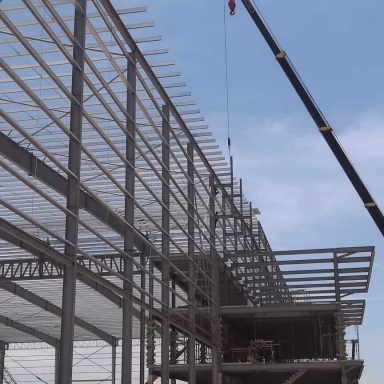 A project picture of jobsite showing the steel structure of purlins and metal roofing sheets Juta Steel galvanised purlins Bumbung Besi JSC JSZ JutaDek 762 Metal Roofing Sheets Transparent Sheet PC roofing FRP roofing